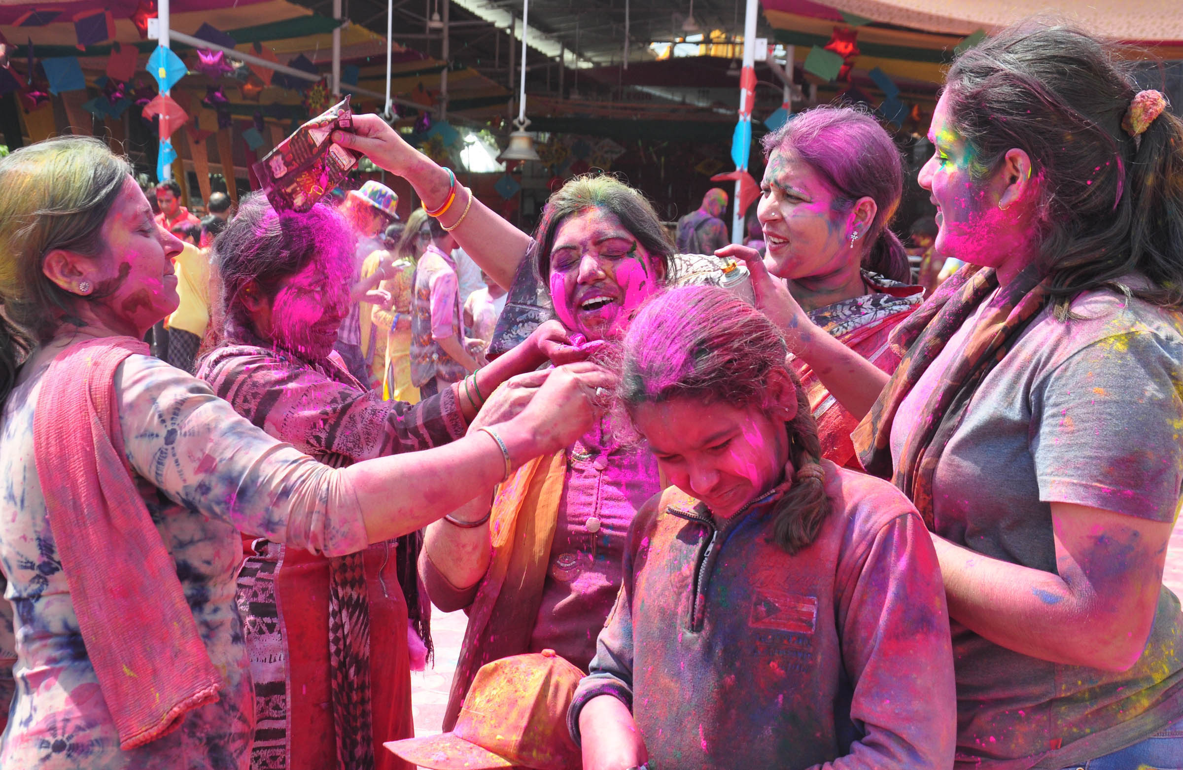 People celebrating the Holi festival