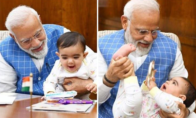 PM MODI PLAYING WITH A BABY IN HIS OFFICE