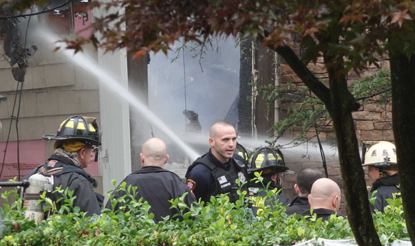 COLONIA (U.S.), Oct. 30, 2019 (Xinhua) -- Firefighters work on the scene of a small plane crash in Colonia, New Jersey, the United States, on Oct. 29, 2019. A small plane crashed into a house in Colonia, U.S. state of New Jersey, on Tuesday, setting fire to it and two others, authorities said. Xinhua/UNI PHOTO-4F