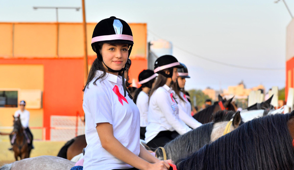 GAZA, Oct. 31 (Xinhua) -- Palestinian horsewomen take part in an event to support breast cancer patients in Gaza City, on Oct. 30, 2019. A total of 40 horsewomen and their families joined a public gathering in Gaza on Wednesday to show support for women with breast cancer.Xinhua/ UNI PHOTO-6F