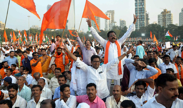 MUMBAI,NOV 28 (UNI) - Shiv Sena suporters during Maharshtra CM swearing-in ceremony as the 18th Chief Minister of Maharashtra, at Shivaji Park in Mumbai on Thursday. UNI PHOTO-99U