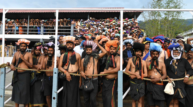 SABARIMALA, NOV 20 (UNI) - Ayyappa Devotees coming for Darshan being blocked with ropes stretched across the trekking path to avoid heavy rush, during the mandala makaravilakku festival season in sabarimala on Wednesday. UNI PHOTO-57U