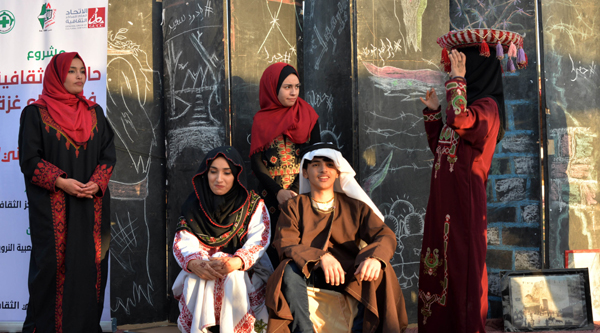 GAZA, NOV 19 (Xinhua) -- Palestinians show traditional Palestinian dress during a heritage exhibition in Maghazi refugee camp, central Gaza Strip, Nov. 18, 2019. Xinhua/UNI PHOTO-7F