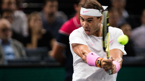 PARIS, Nov. 1 (Xinhua) -- Rafael Nadal of Spain hits a return during the singles third round match against Stan Wawrinka of Switzerland at the Rolex Paris Masters 1000 held at the AccorHotels Arena in Paris, France, Oct. 31, 2019. Xinhua/UNI PHOTO-3F