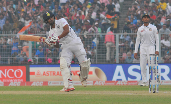 KOLKATA, NOV 23 (UNI) Wriddhiman Saha play a shot against Bangladesh during historic first day night pink ball test between India and Bangladesh at Eden Gardens in Kolkata on Saturday.UNI PHOTO-66U