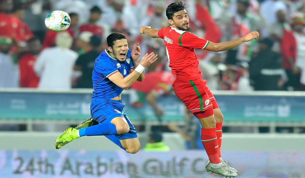 DOHA, Dec. 1, 2019 (Xinhua) -- Abdulaziz AL Maqbali (R) of Oman vies with Siltan Alenezi of Kuwait during the 24th Arabian Gulf Cup 2019 Group B football match at the Abdullah bin Khalifa Stadium in Doha, capital of Qatar, Nov. 30, 2019. Xinhua/UNI PHOTO-4F