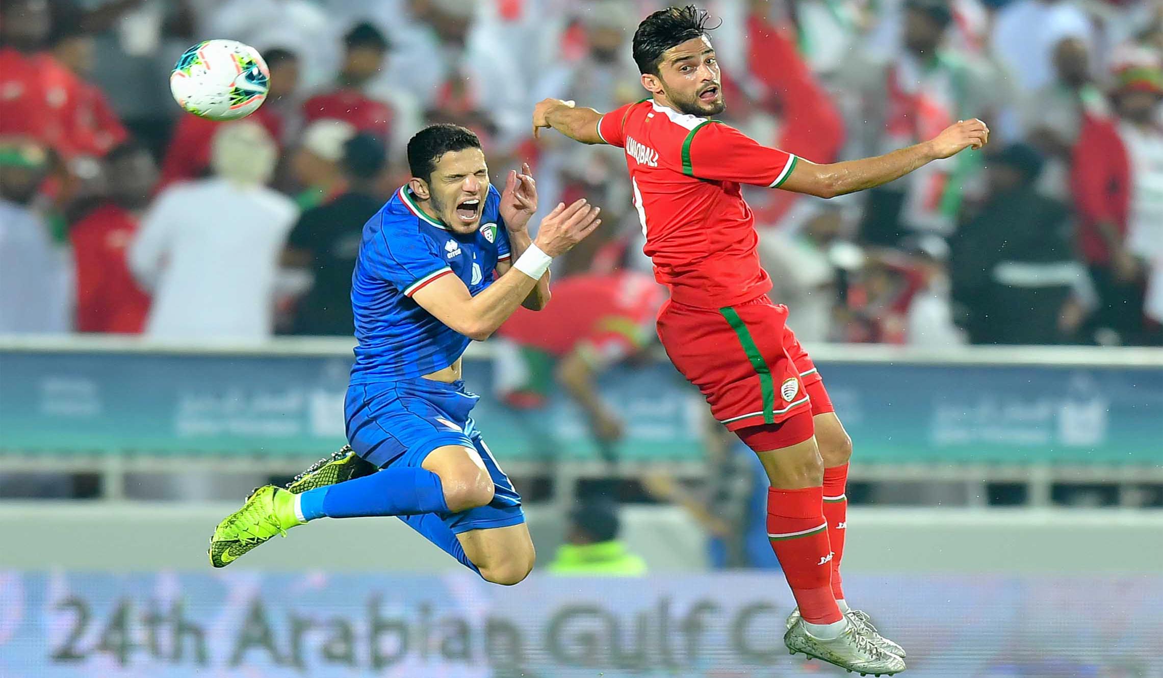 DOHA, Dec. 1, 2019 (Xinhua) -- Abdulaziz AL Maqbali (R) of Oman vies with Siltan Alenezi of Kuwait during the 24th Arabian Gulf Cup 2019 Group B football match at the Abdullah bin Khalifa Stadium in Doha, capital of Qatar, Nov. 30, 2019. Xinhua/UNI PHOTO-4F