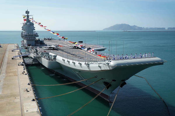 SANYA, Dec. 27, 2019 (Xinhua) -- Photo taken on Dec. 17, 2019 shows the Shandong aircraft carrier at a naval port in Sanya, south China's Hainan Province. China's first domestically built aircraft carrier, the Shandong, was delivered to the People's Liberation Army (PLA) Navy and placed in active service on Dec. 17 at a naval port in Sanya. The new aircraft carrier, named after Shandong Province in east China, was given the hull number 17. (Xinhua/Li Gang/IANS)