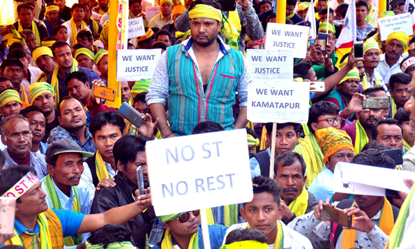 GUWAHATI, DEC, 3, (UNI):-Members of AKRSU staging a dharna on their demand for ST status in Guwahati on Tuesday.UNI PHOTO-38U