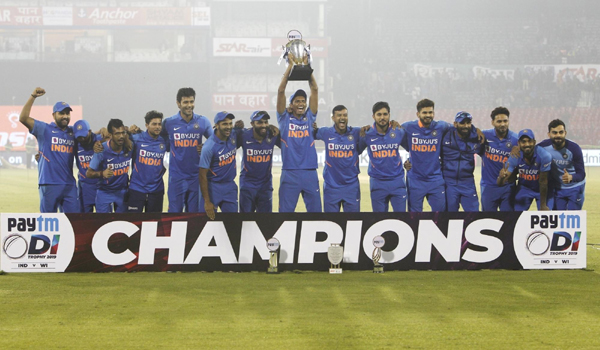 Cuttack: Indian team with the Trophy after winning the three-match one day international (ODI) series against West Indies 2-1 at the Barabati Stadium in Cuttack, Odisha, on Dec 22, 2019. (Photo: Surjeet Yadav/IANS)