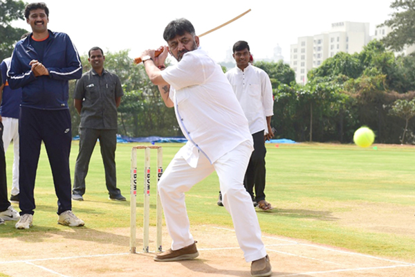 Bengaluru: Former Karnataka Minister D. K. Shivakumar plays cricket during the inauguration of Media Cricket Tournament at Central College Grounds of PES University, in Bengaluru on Dec 21, 2019. (Photo: IANS)