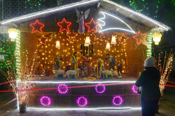 Kolkata: People attend a midnight mass in Kolkata church on Christmas, on Dec 25, 2019. (Photo: Kuntal Chakrabarty/IANS)