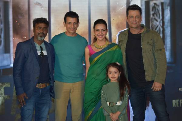 Mumbai: Director Aaryaan Saxena with actors Sharman Joshi, Bidita Bag, Vikram Singh and child artiste Mahi Soni at the first look launch of their upcoming film "Fauji Calling", in Mumbai on Dec 20, 2019. (Photo: IANS)