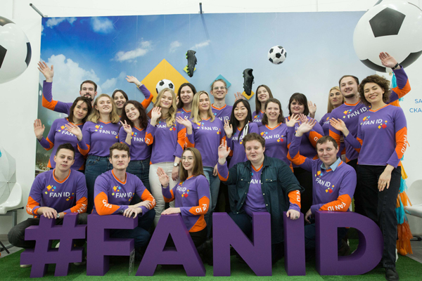 SAINT PETERSBURG, Dec. 4, 2019 (Xinhua) -- Staff pose for photograph at a newly-opened fan ID center of the UEFA Euro 2020 soccer tournament finals in Saint Petersburg, Moscow, Dec. 4, 2019. Saint Petersburg will be one of the twelve cities to host the UEFA Euro 2020 soccer tournament finals next year. (Photo by Irina Motina/Xinhua/UNI PHOTO-14F