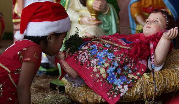 Chennai: A child attends a midnight mass in Chennai church on Christmas, on Dec 25, 2019. (Photo: IANS)