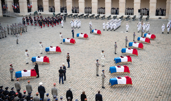 PARIS, Dec 3 (Xinhua) -- People attend a tribute ceremony for the fallen servicemen at the Les Invalides in Paris, France, on Dec. 2, 2019. France held the ceremony here on Monday to pay tribute to 13 soldiers who died in a helicopter accident in Mali a week ago. Xinhua/ UNI PHOTO-3F