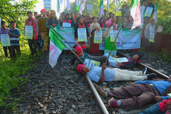 AGARTALA, DEC 5 (UNI):- Indigenous Nationalist Party of Twipra activists blocking rail track in protest against the Citizenship Amendment Bill -2109, near Agartala on Thursday. UNI PHOTO- 6U