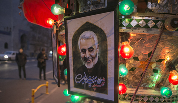 (200103) -- TEHRAN, Jan. 3, 2020 (Xinhua) -- A poster of top Iranian commander Qasem Soleimani is seen on a street in Tehran, Iran, on Jan. 3, 2020. An attack near Baghdad International Airport on Friday has killed top Iranian commander Qasem Soleimani, and Abu Mahdi al-Muhamdis, the deputy top leader of Iraq's paramilitary Hashd Shaabi forces. (Photo by Ahmad Halabisaz/Xinhua)