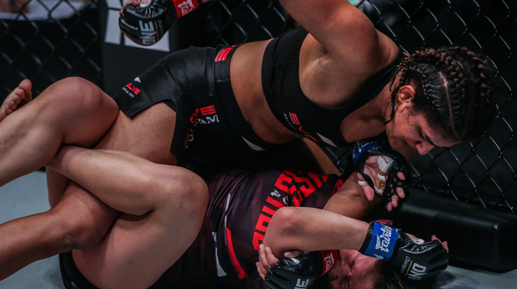 Singapore: India's champion wrestler-turned-Mixed Martial Arts (MMA) fighter Ritu Phogat and China's Wu Chiao Chen in action during the One: King of the Jungle at the Singapore Indoor Stadium, in Singapore, on Feb 28, 2020. (Photo: IANS)