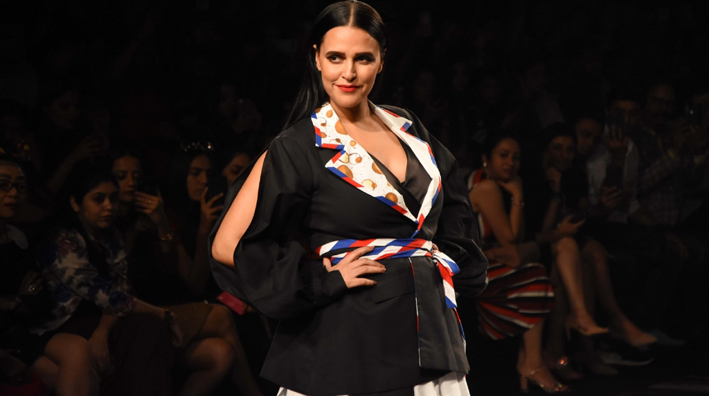 Mumbai: Actress Neha Dhupia showcases the creation of fashion designer Itishree Satpathy on Day 2 of the Lakme Fashion Week Summer/Resort 2020, in Mumbai on Feb 12, 2020. (Photo: IANS)