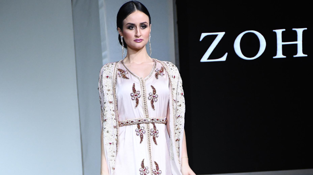 (200301) -- CASABLANCA, March 1, 2020 (Xinhua) -- A model presents a creation during the Caftan Mazagan fashion show in Casablanca, Morocco, Feb. 29, 2020. The Caftan is a traditionnal dress worn by Moroccan women for special occasions such as weddings or engagement parties. (Photo by Chadi/Xinhua)