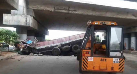 Hyderabad: A cement laden truck skidded off Shamirpet flyover in Hyderabad injuring two, on May 30, 2020. (Photo: IANS)