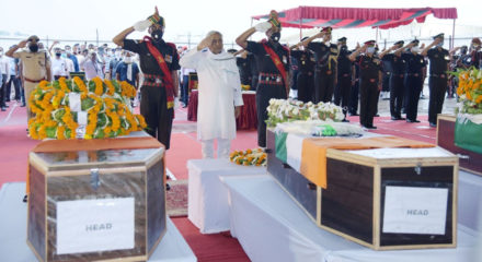 Patna: Bihar Chief Minister Nitish Kumar pays his respect to the mortal remains of martyrs who among 20 Indian soldiers killed in a clash with Chinese forces in Galwan Valley along the Line of Actual Control (LAC) in eastern Ladakh region on Monday; during wreath laying ceremony at Jay Prakash Narayan International Airport in Patna on June 18, 2020. (Photo: IANS)