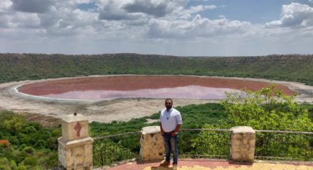 Buldhana: The world famous Lonar Lake, formed by a high velocity impact of a celestial body around 57,000 years ago, has changed colours from bluish-green to a bright baby-pink shade, astounding all, says Buldhana Tehsildar Saipan Nadaf. (Photo: IANS)