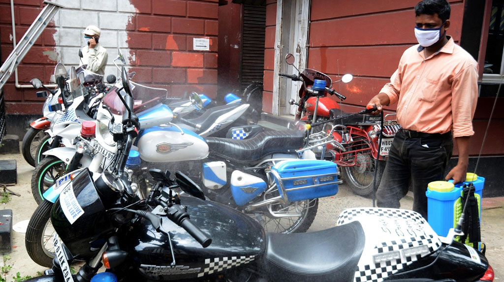 Kolkata: A health worker sprays disinfectant in Lalbazar amid the ongoing COVID-19 lockdown, in Kolkata on June 26, 2020. (Photo: IANS)