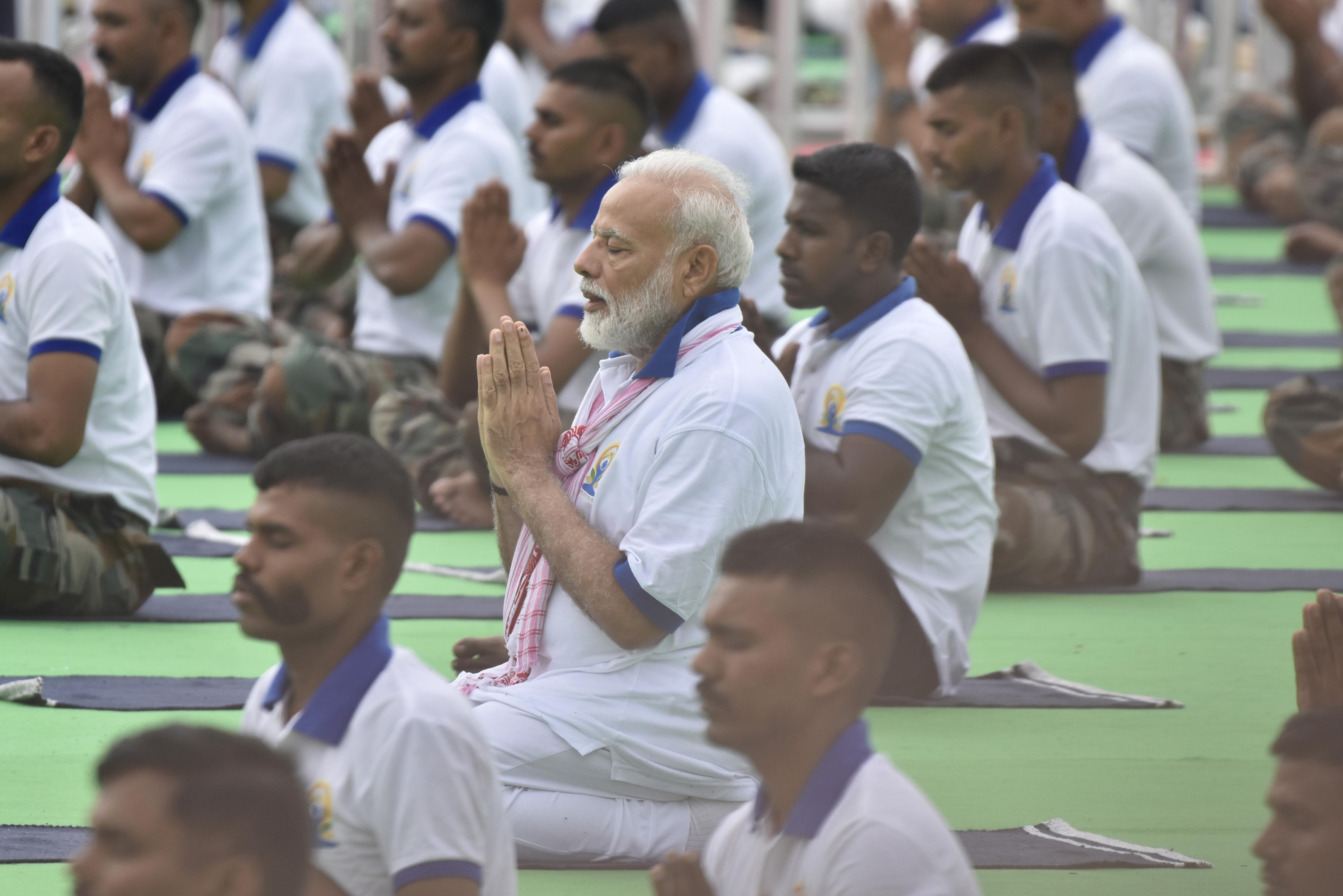 Prime Minister Narendra Modi performing yoga asana during the 5th International Yoga Day in Ranchi on Friday.UNI PHOTO-27U