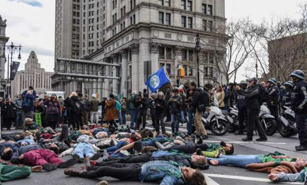 UK Environmental Campaign Activists peacefully block entrance to concrete plant in London