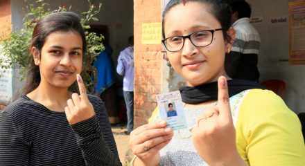 PALAMU, NOV 30 (UNI):-Ladies showing their inked finger after casting his vote during during 1st phase of Assembly Election at, in Palamu on Saturday. UNI PHOTO-54U