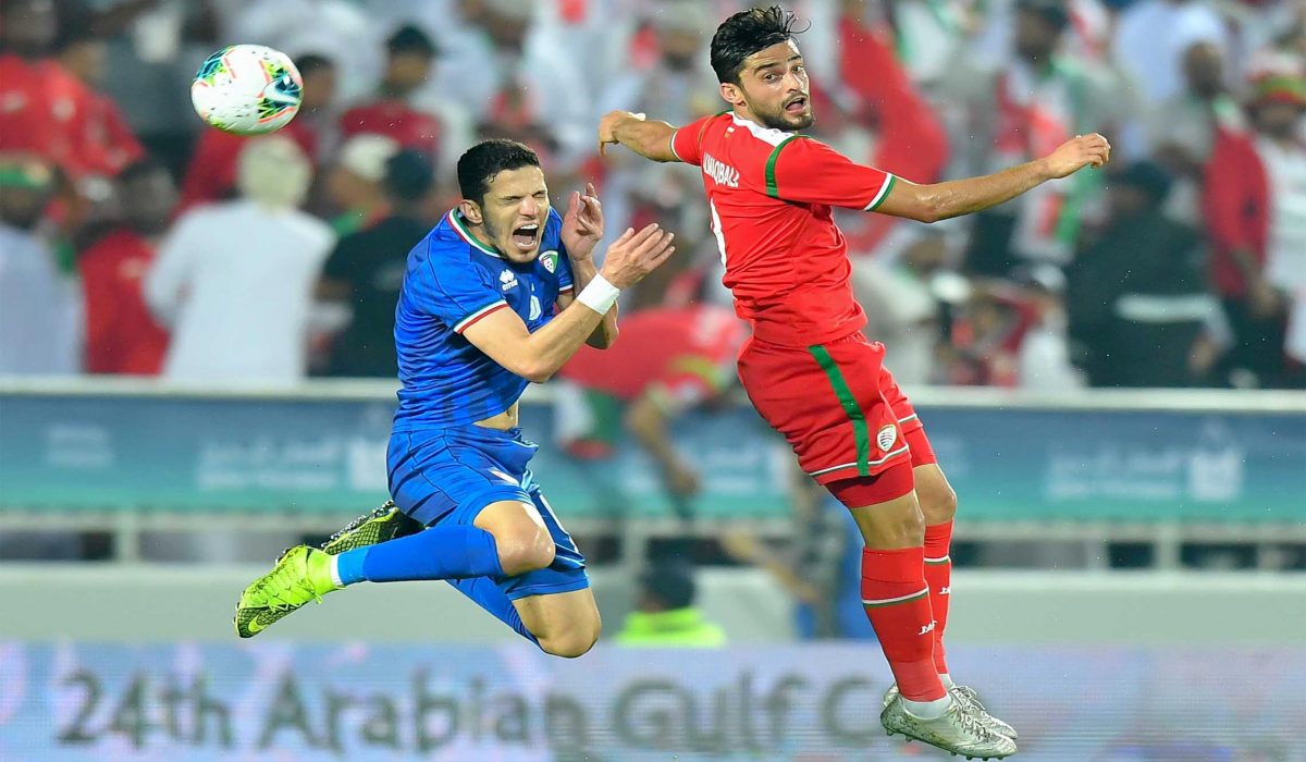 DOHA, Dec. 1, 2019 (Xinhua) -- Abdulaziz AL Maqbali (R) of Oman vies with Siltan Alenezi of Kuwait during the 24th Arabian Gulf Cup 2019 Group B football match at the Abdullah bin Khalifa Stadium in Doha, capital of Qatar, Nov. 30, 2019. Xinhua/UNI PHOTO-4F