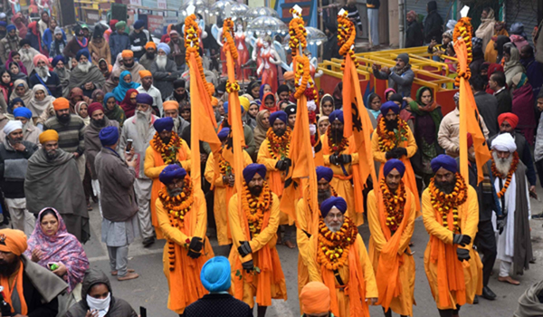 Patna: Sikh devotees participate in a 'Nagar Kirtan' - religious procession - organised to mark the birth anniversary of 10th Sikh Guru, Guru Gobind Singh, on Dec 31, 2019. (Photo: IANS)