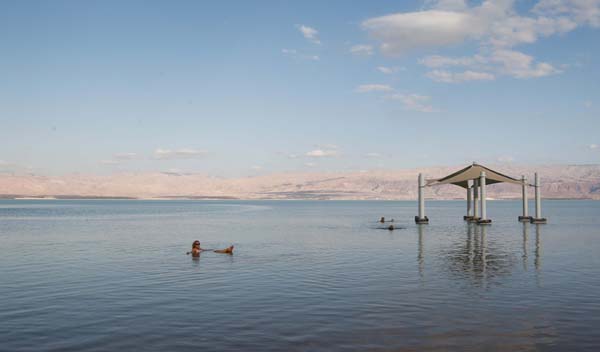NEVE ZOHAR, Dec. 29, 2019 (Xinhua) -- Tourists enjoy themselves in the southern part of the Dead Sea near the Neve Zohar resort, Israel, Dec. 28, 2019. Neve Zohar is a popular tourist destination for local residents. (Photo by Gil Cohen Magen/Xinhua/IANS)