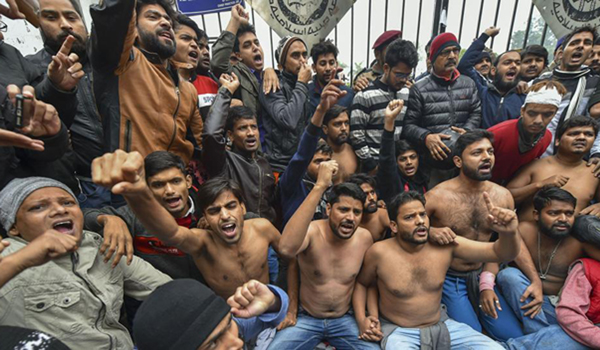 One eye 'bandaged', Jamia students continue protests
