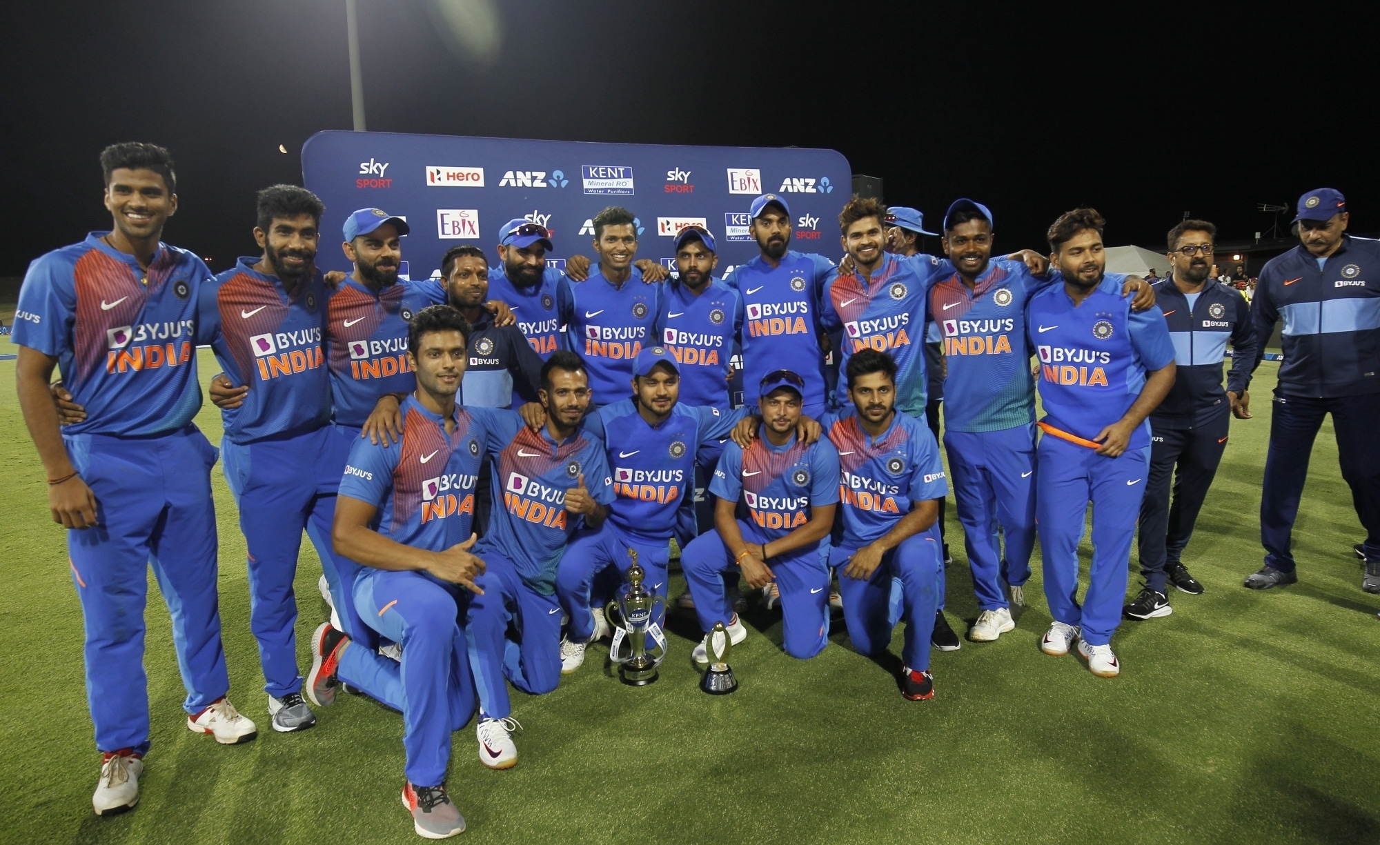 Mount Maunganui: Indian players pose with the Winners Trophy after India scripted an unprecedented 5-0 series whitewash with a seven-run victory against New Zealand in the fifth and final T20I at Bay Oval, Mount Maunganui in New Zealand on Feb 2, 2020. (Photo: Surjeet Yadav/IANS)