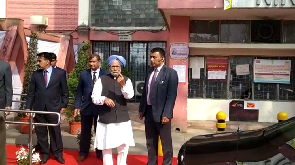 New Delhi: Congress leader Manmohan Singh leaves after casting his vote for the Delhi Assembly elections 2020 at a polling booth in central Delhi's Nirman Bhawan on Feb 8, 2020. (Photo: IANS)