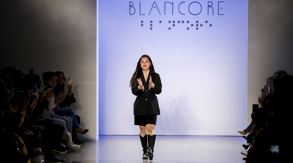 NEW YORK, Feb. 7, 2020 (Xinhua) -- Li Yalan, founder and creative director of Blancore, greets the audience at the end of Blancore's show during the New York Fashion Week in New York, the United States, on Feb. 7, 2020. (Xinhua/Wang Ying/IANS)