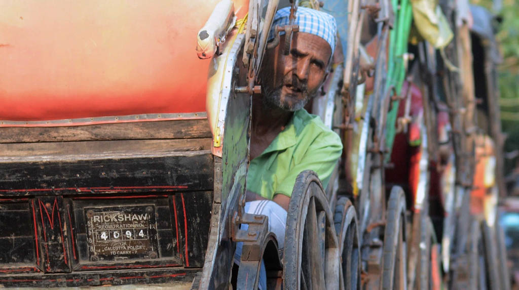 Kolkata: A rickshaw puller awaits passengers in Kolkata during the fifth phase of the nationwide lockdown imposed to mitigate the spread of coronavirus, on June 5, 2020. (Photo: Kuntal Chakrabarty/IANS)