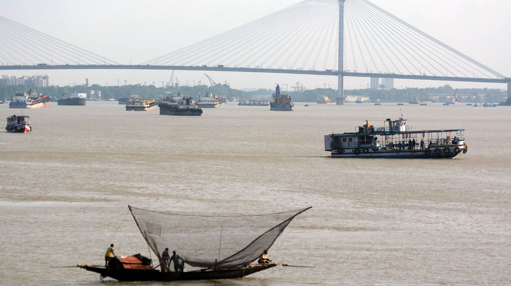 Kolkata: Fishermen go fishing on their boats at the Ganga river during nationwide lockdown 5 imposed in the wake of COVID 19 Coronavirus pandemic in Kolkata on June 26, 2020. (Photo: Kuntal Chakrabarty/IANS)