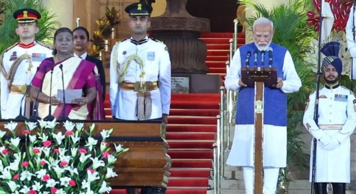 Narendra Modi takes oath